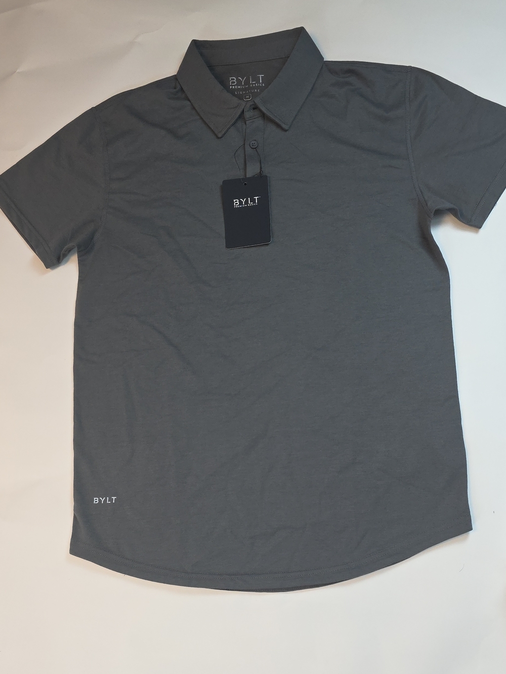 NWT Men's BYLT Premium Basics Signature Drop-Cut Polo. Color Charcoal. Size Med